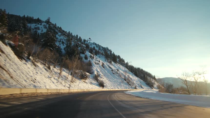 A view of mountains covered in snow