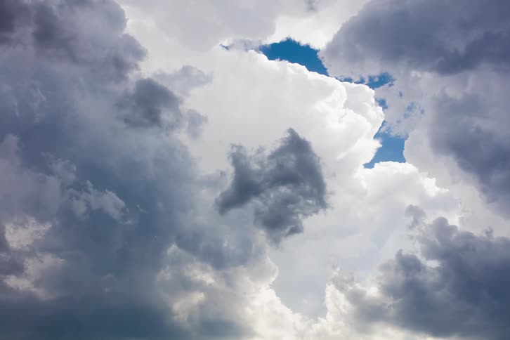 Dark clouds gather float in the sky