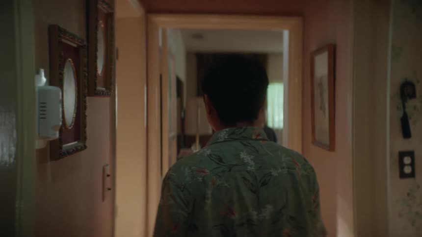 Man waves to his spouse as he leaves