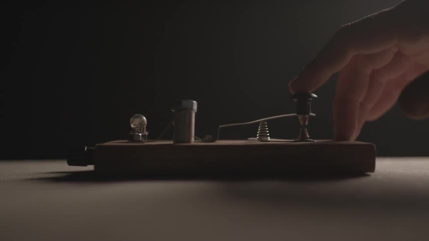 Person using a morse code device
