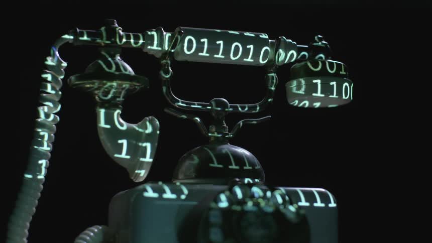 Flickering numbers being projected onto an antique rotary phone