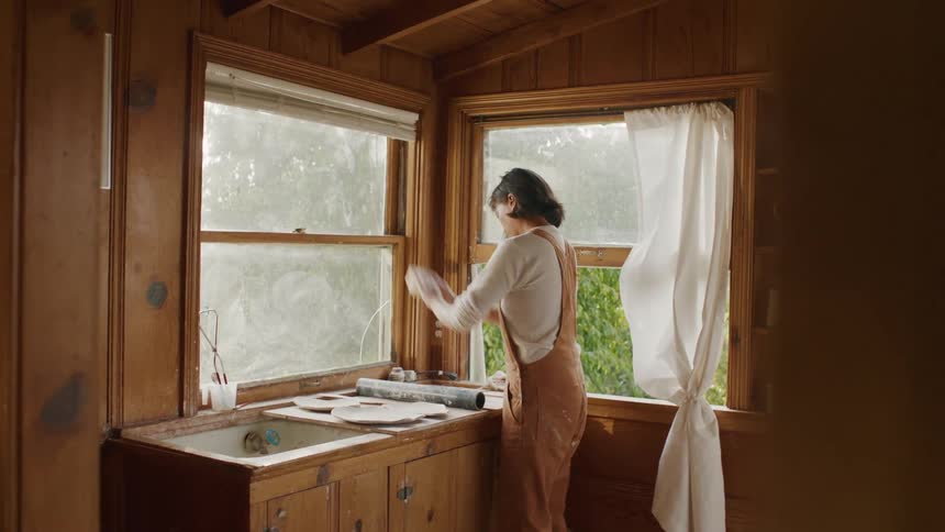 Woman kneading dough