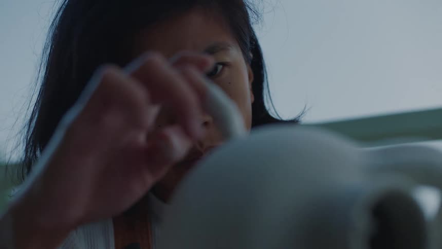 A woman working on pottery