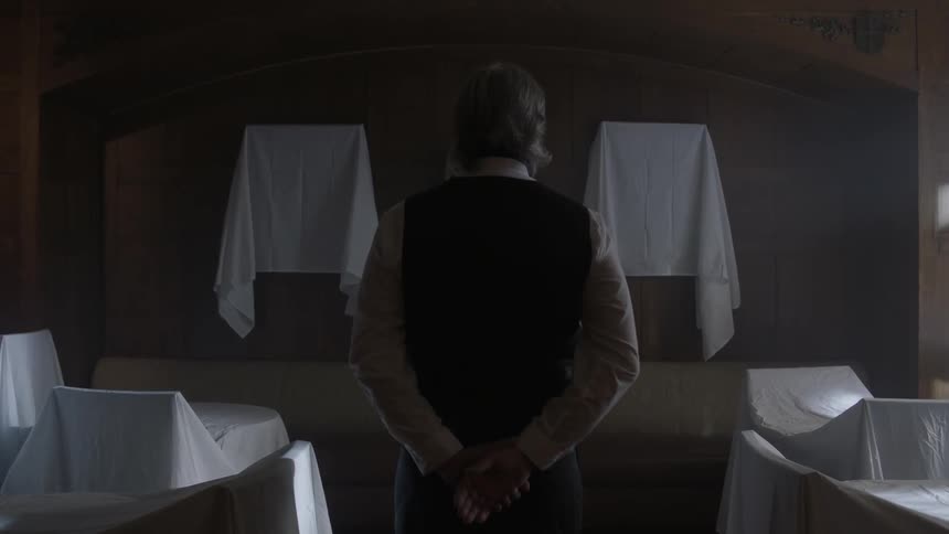 A room is empty when a man walks in