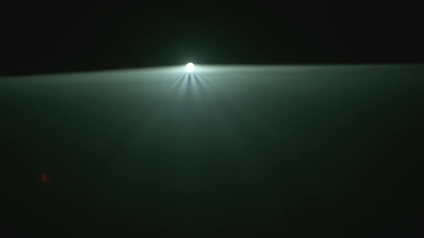A light is flashing in the dark