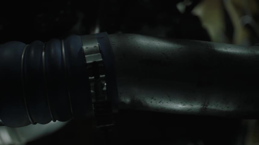 A hose in an engine has clasps