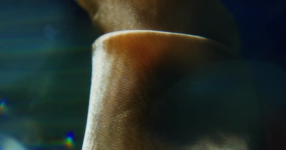A piece of fabric floating and billowing underwater