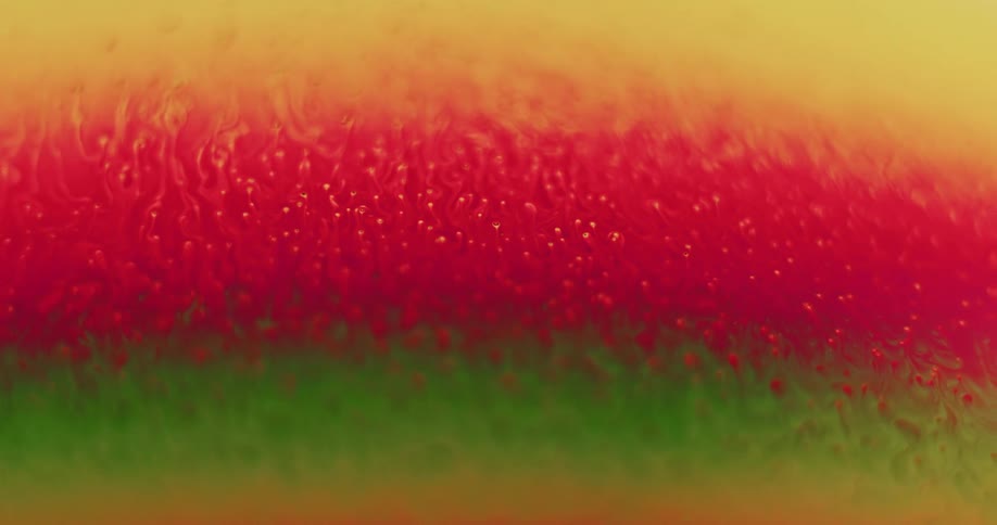 A liquid shifting its colors