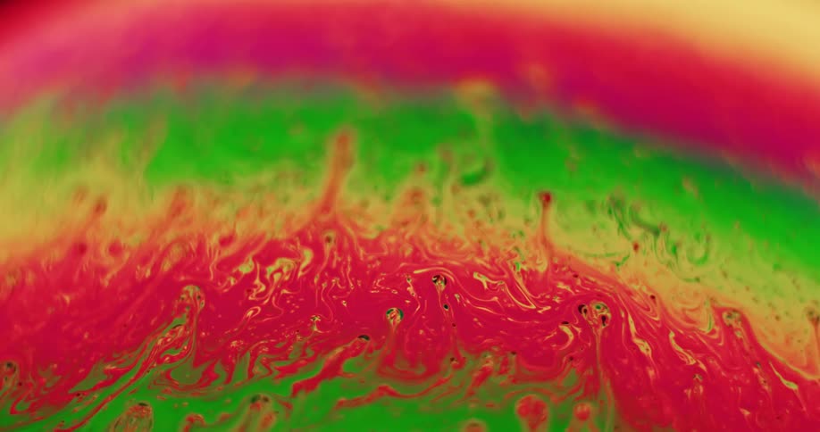 Streaks flow through bands of vivid color in mixture