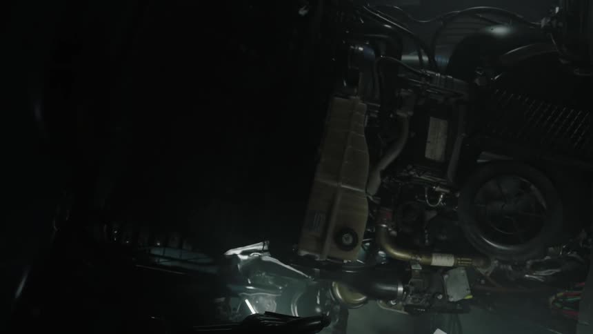 An engine below is dimly lit