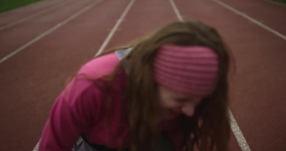 A woman injuries herself on the track