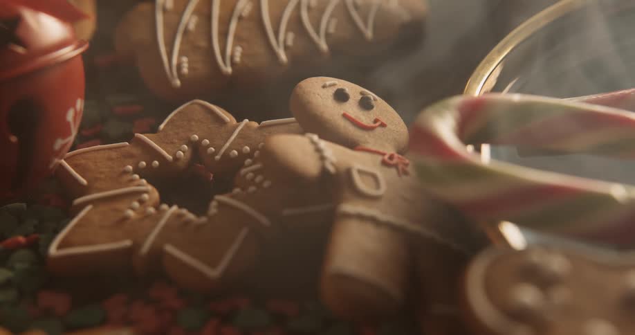 A pile of gingerbread cookies and candy canes