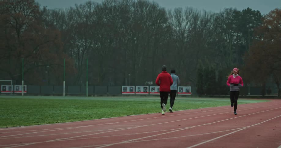 People are running on the track