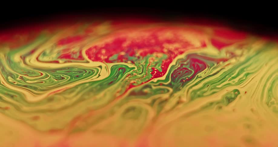 Red and green dye are added to yellow paint