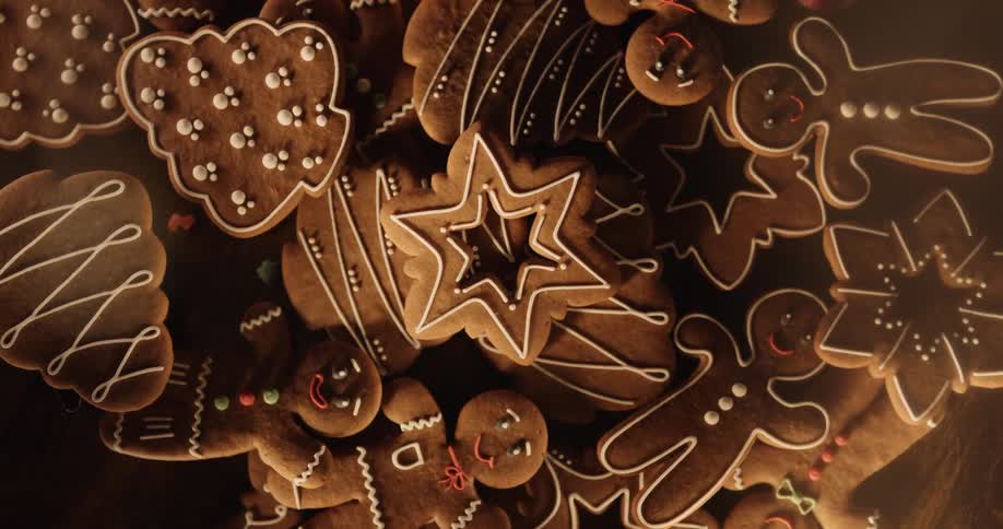 Holiday cookies of gingerbread men and stars are on the table