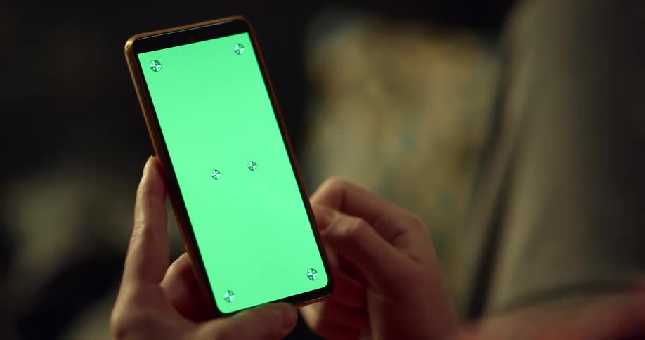Woman scrolls and makes selections on smartphone