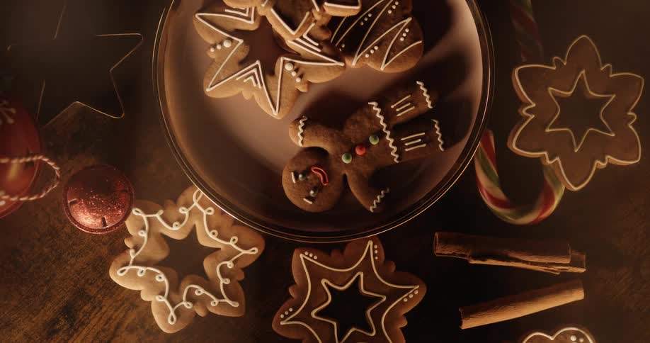 Gingerbread cookies and candy is on a table