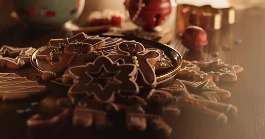 Pile of christmas shaped gingerbread cookies on display on table for the holidays