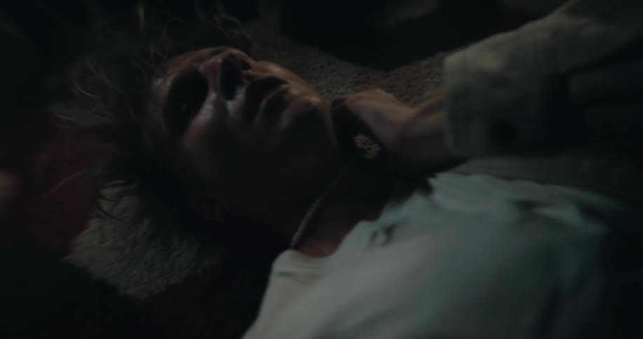 A man laying on the floor doing random things