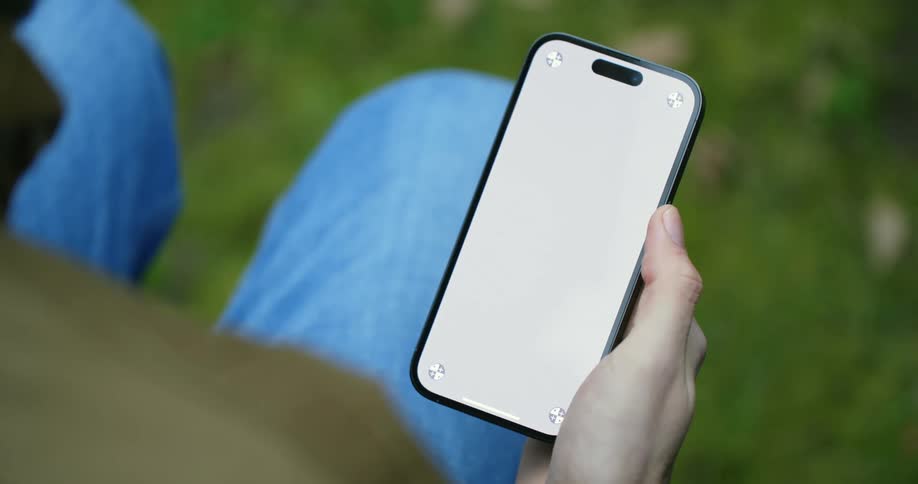 A persons fingers scrolling their phone screen