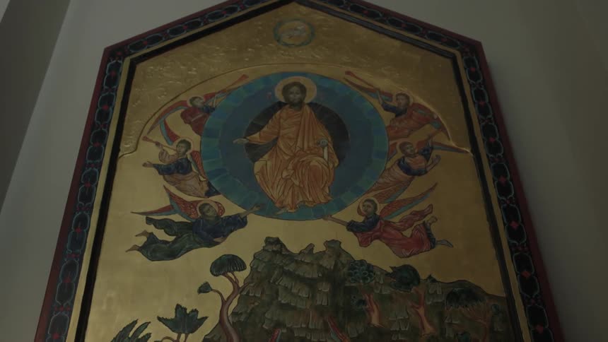 Sunlight shining on a church painting