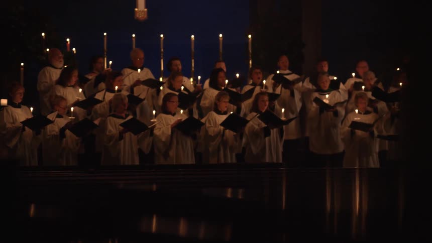 A church choir sings inside a building