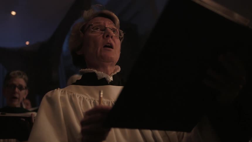 People are singing in a choir