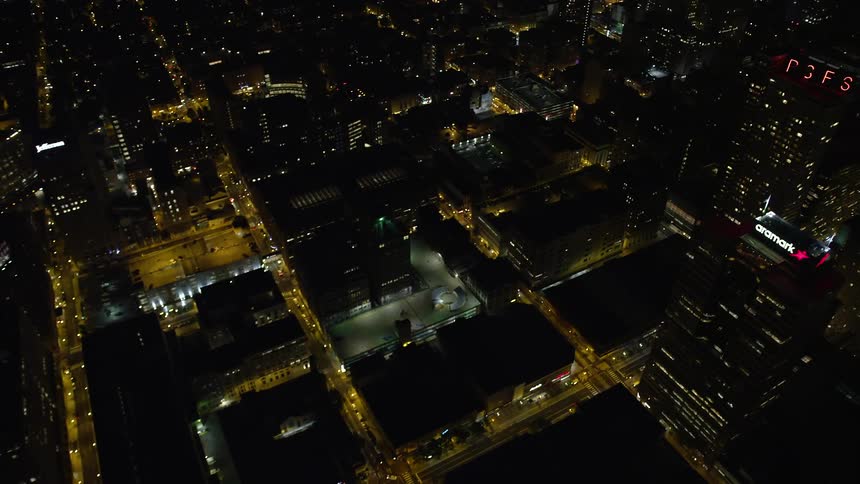 A breathtaking aerial view of downtown Philadelphias office buildings and streets at night