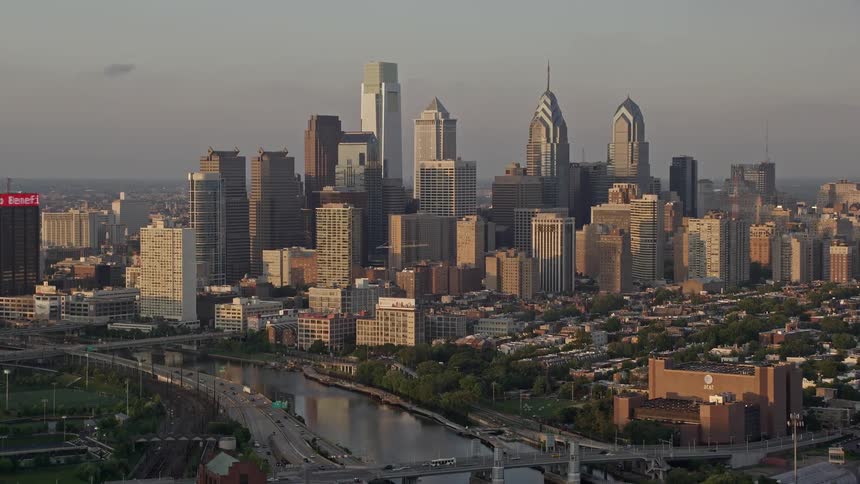Aerial view of Philadelphias downtown skyline during sunset seen from the Schuylkill River