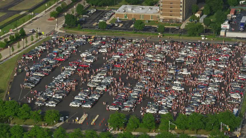 Aerial footage captures a crowded parking lot near Campbells Field in Camden New Jersey on a sunny day