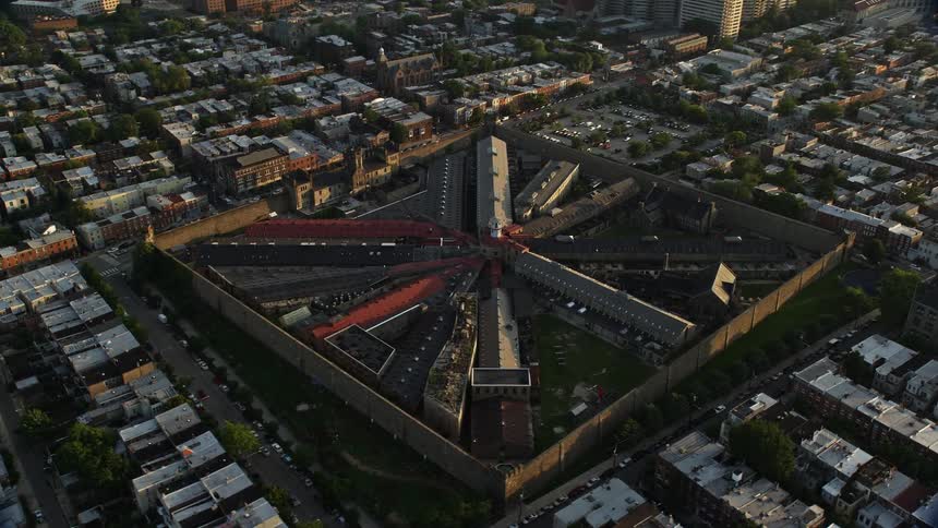 A stunning aerial view of Eastern State Penitentiary in Philadelphia Pennsylvania at dusk