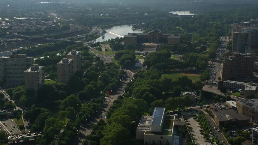 Aerial footage of Benjamin Franklin Parkway leading to Philadelphia Museum of Art Pennsylvania on a hazy day
