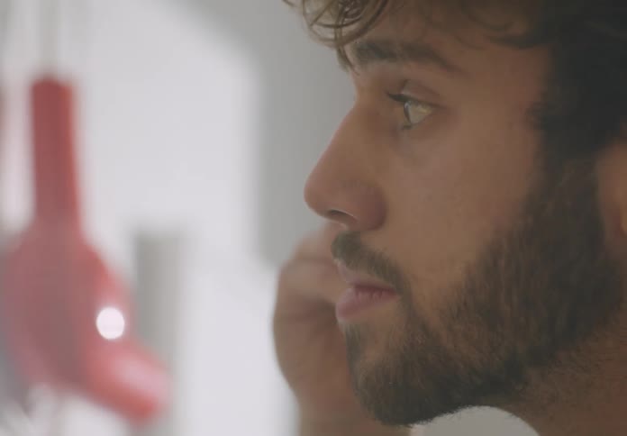 Man with beard doing his skincare routine