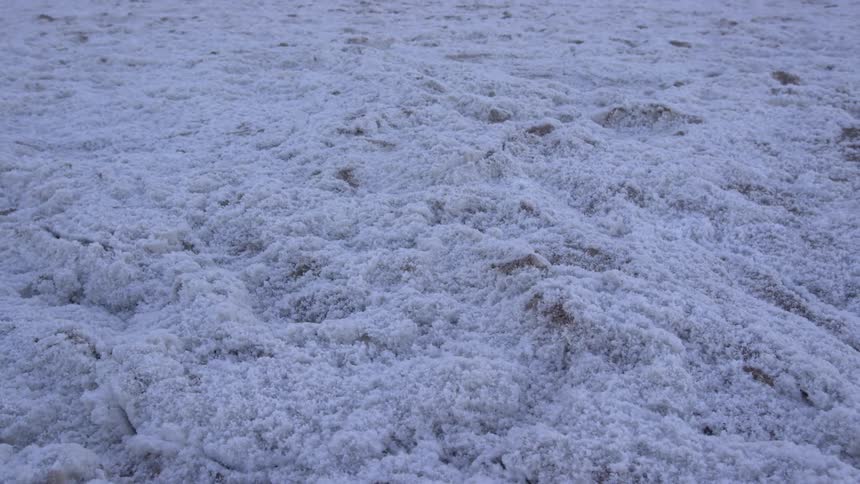 Snow sits atop the landscape