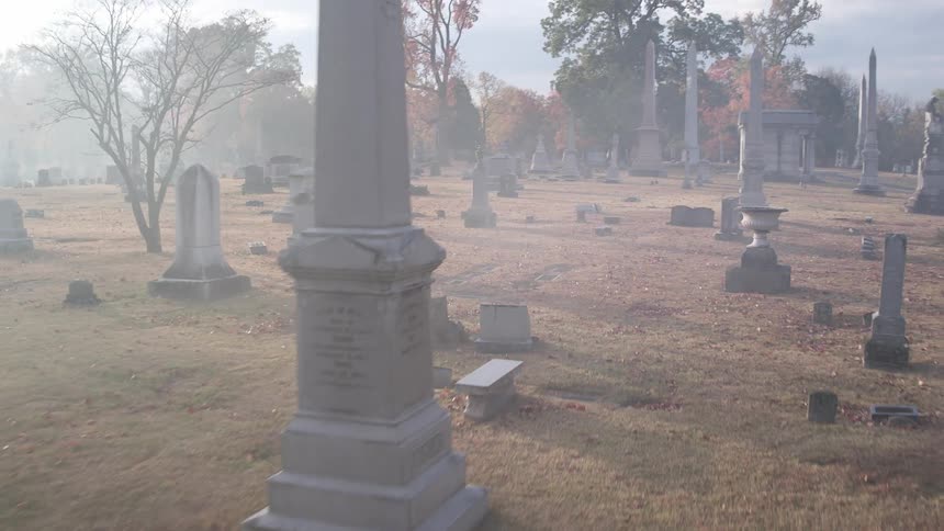 A misty cemetery during the day