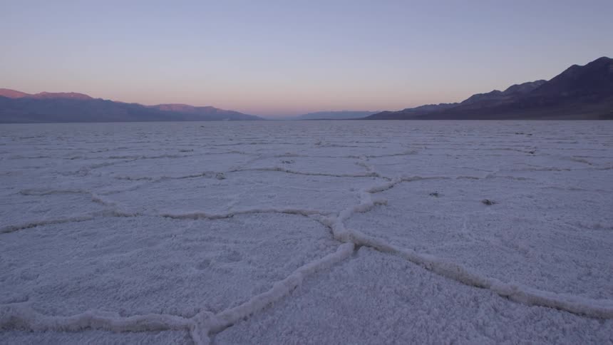 A salt flat at dusk