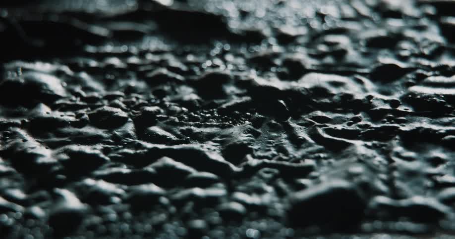 Black textured surface bubbles up
