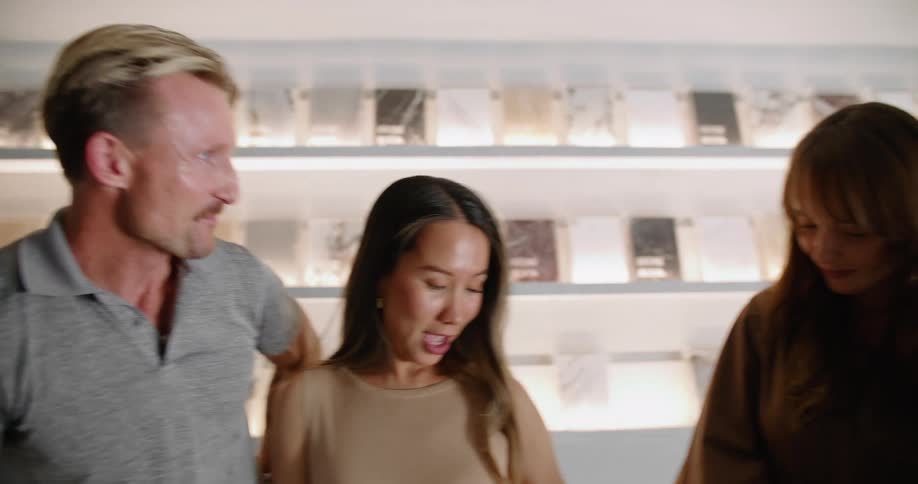 Two people shopping for something