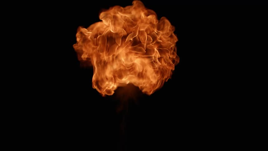 A burst of flames moves up in the air