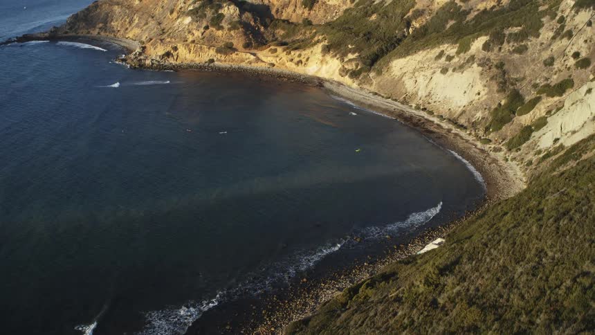 A natural harbor close to a hill