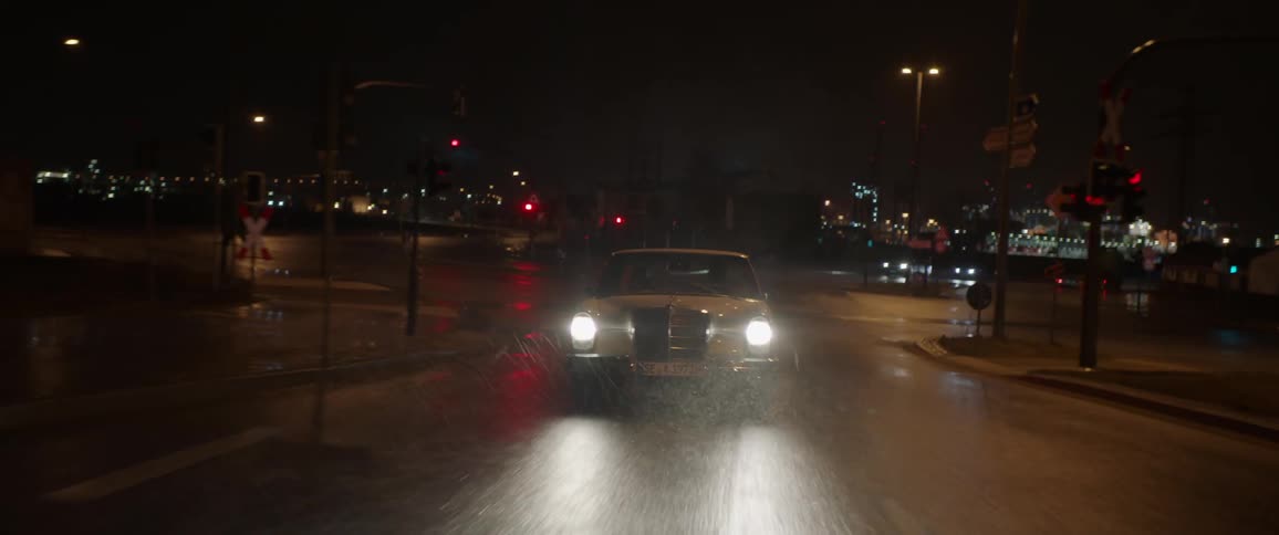 A car driving in rain