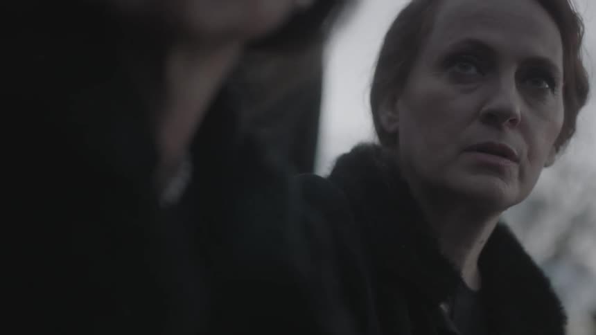 Grieving Woman At Funeral