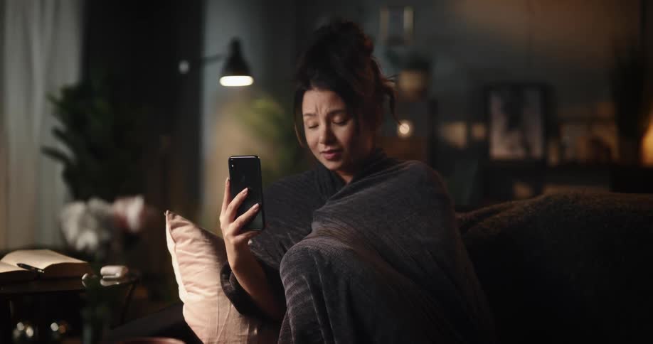 A woman talking on a smartphone