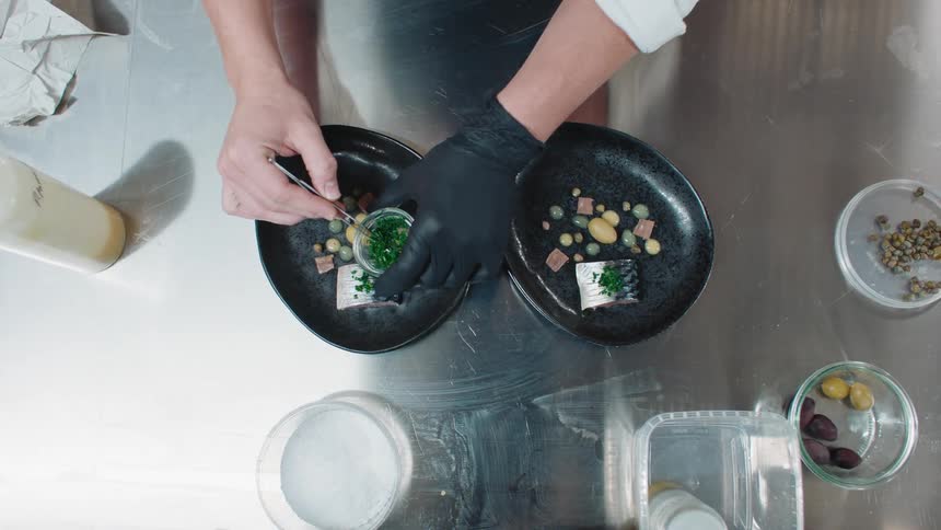 A chef is preparing a meal