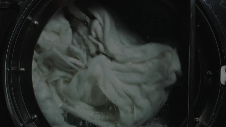 Laundry spins in a washing machine