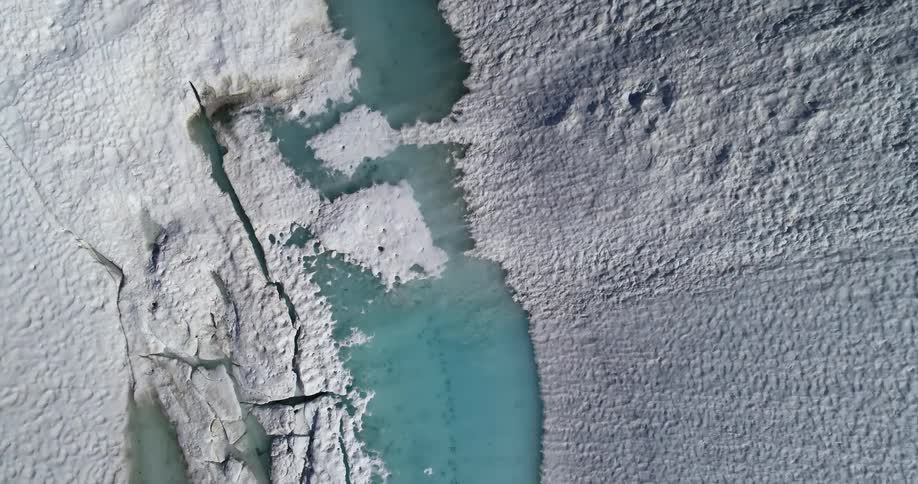 Aerial view of an arctic area is displayed