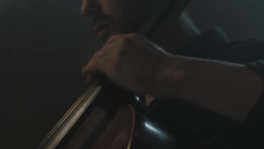 A man is playing a musical instrument