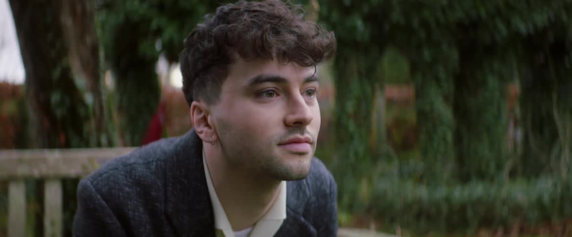 A man is sitting in the park