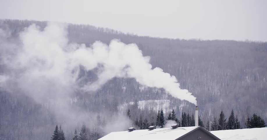 Smoke is rising from the chimney