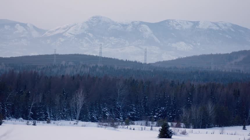 The mountain range is covered with snow